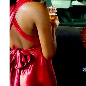 Absolutely beautiful prom dress with train , the material is outta this world.